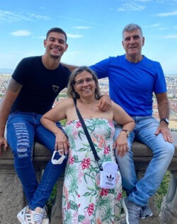 Bruno Guimaraes with his parents'